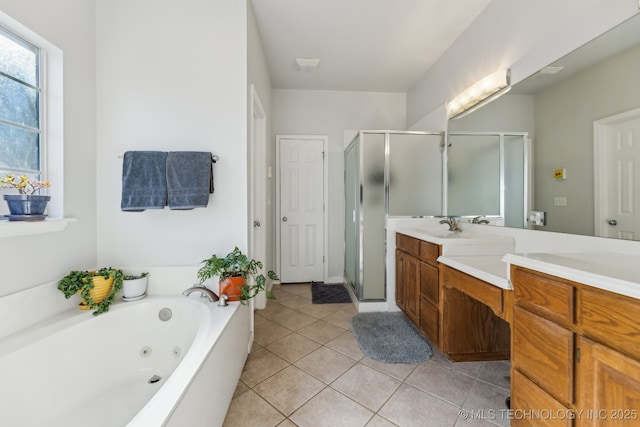 bathroom featuring vanity, separate shower and tub, and tile patterned floors