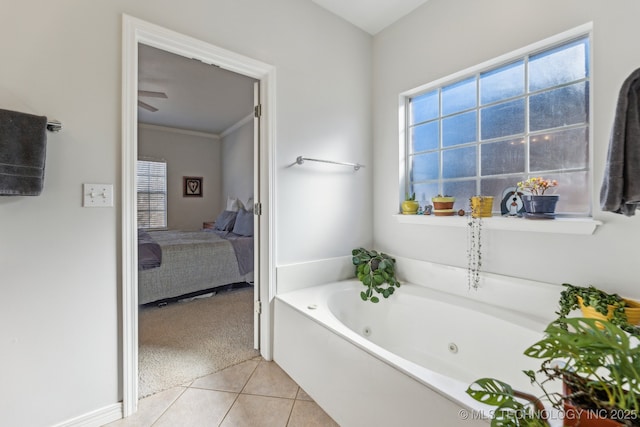 bathroom with tile patterned floors and a bathtub