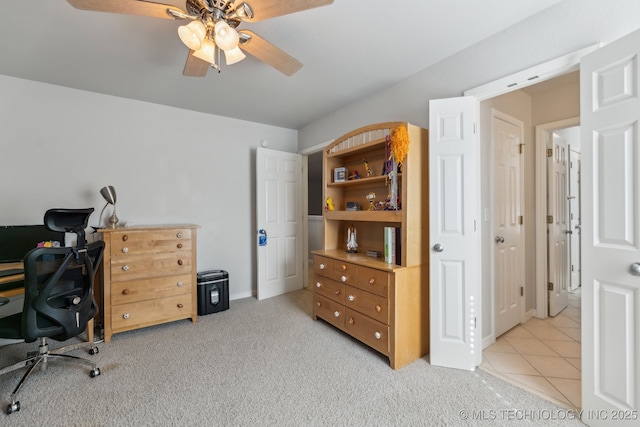 home office with light colored carpet and ceiling fan