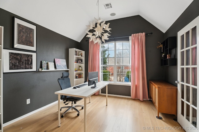 office area with lofted ceiling and light hardwood / wood-style floors