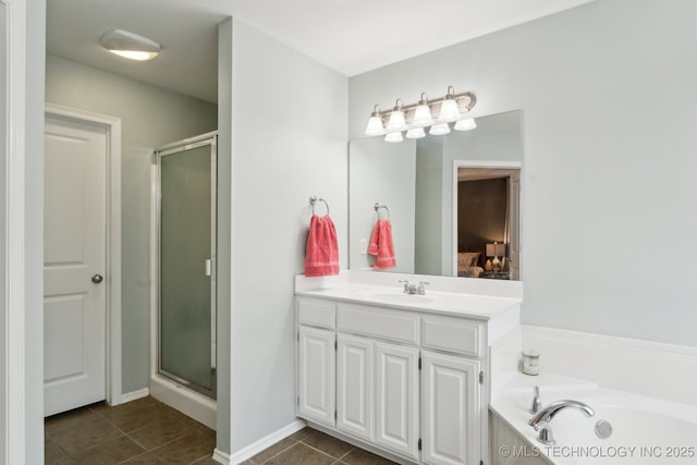 bathroom featuring tile patterned flooring, plus walk in shower, and vanity