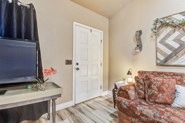 entryway with light hardwood / wood-style flooring