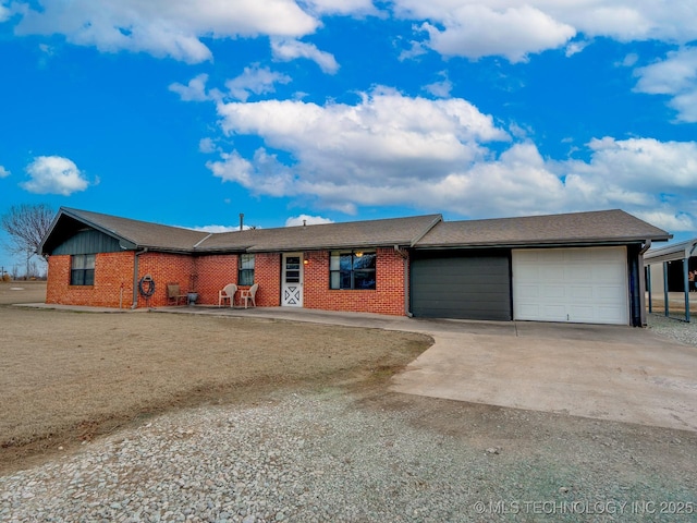 ranch-style home with a garage