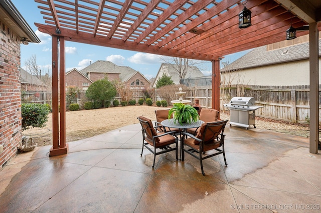 view of patio / terrace featuring a grill and a pergola