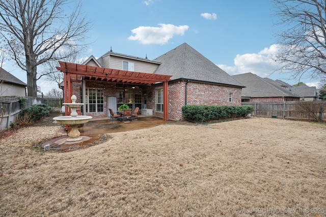 rear view of house with a patio area