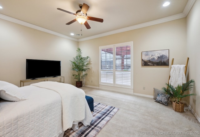 bedroom featuring crown molding, ceiling fan, and light carpet