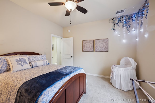 carpeted bedroom featuring ceiling fan