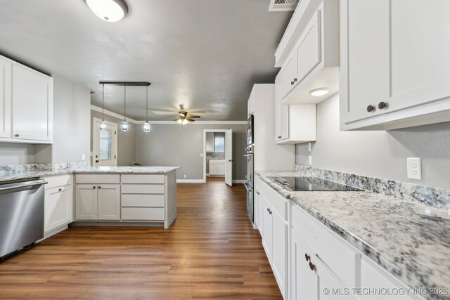 unfurnished dining area featuring crown molding, dark hardwood / wood-style floors, and ceiling fan with notable chandelier