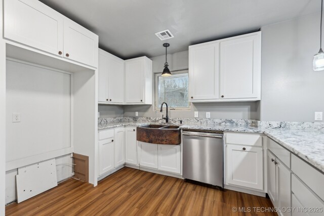 kitchen with pendant lighting, crown molding, white cabinetry, light stone counters, and stainless steel dishwasher