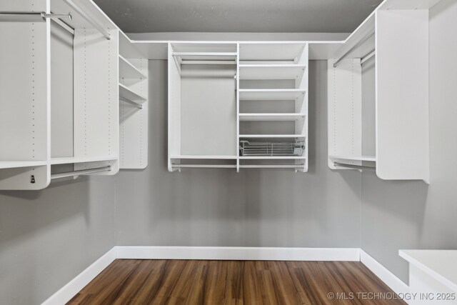 full bathroom featuring hardwood / wood-style flooring, shower / tub combination, vanity, and toilet