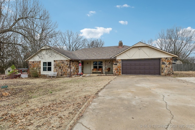 ranch-style house featuring a garage