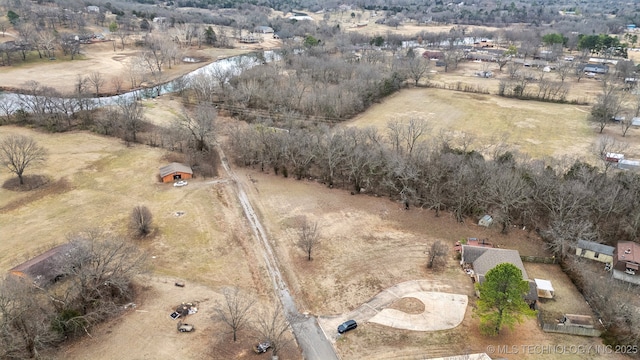 bird's eye view featuring a water view and a rural view