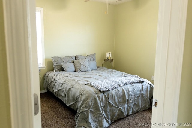 bedroom featuring carpet