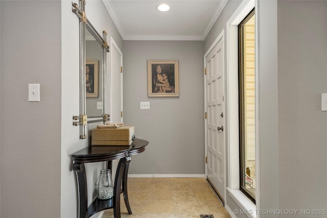 doorway featuring crown molding and a barn door