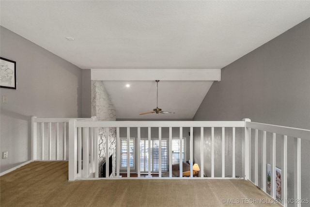 interior space with high vaulted ceiling and carpet