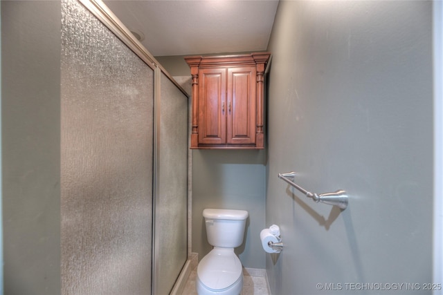 bathroom with walk in shower and toilet