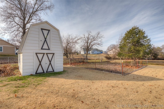 view of outbuilding featuring a yard