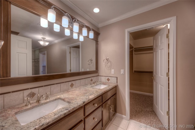 bathroom with tile patterned flooring, crown molding, backsplash, and vanity