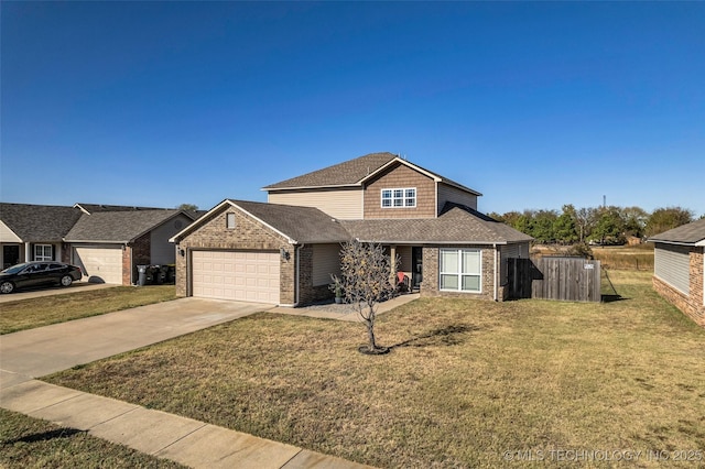 view of front of home featuring a garage and a front lawn