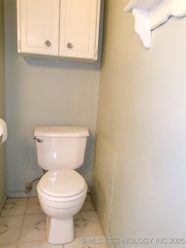 bathroom featuring toilet