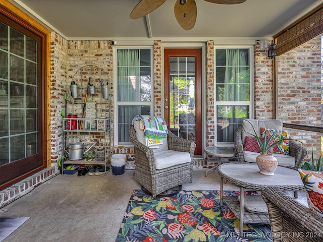 view of patio with ceiling fan