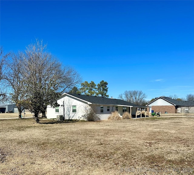 exterior space with a front yard