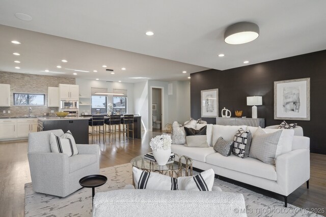 interior space featuring recessed lighting, carpet flooring, and baseboards