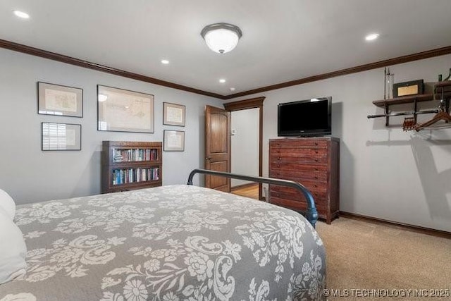 carpeted bedroom featuring crown molding