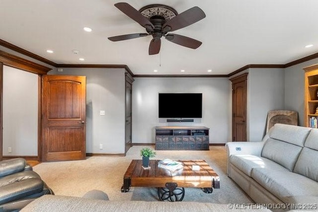 carpeted living room with crown molding and ceiling fan