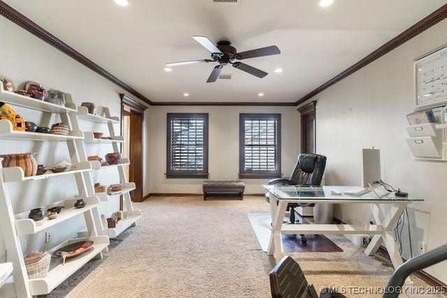 home office featuring crown molding, light colored carpet, and ceiling fan