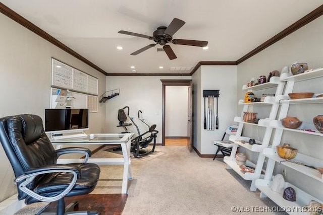 carpeted home office with ornamental molding and ceiling fan