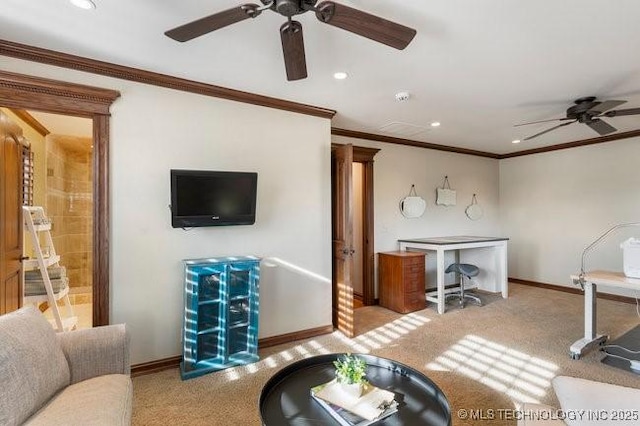 living room with crown molding, light colored carpet, and ceiling fan