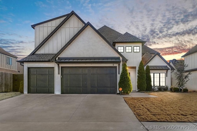 view of front of home with a garage