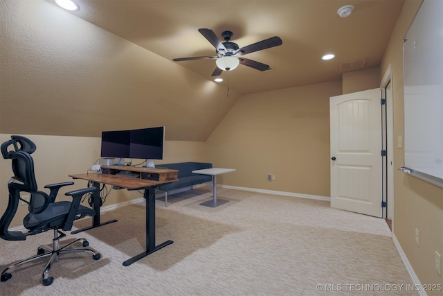 office with vaulted ceiling, light carpet, and ceiling fan