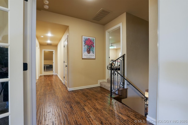 hall featuring dark hardwood / wood-style floors