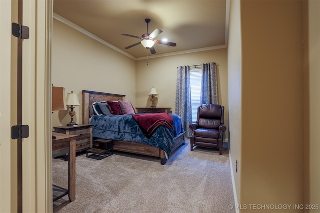 carpeted bedroom with ornamental molding and ceiling fan