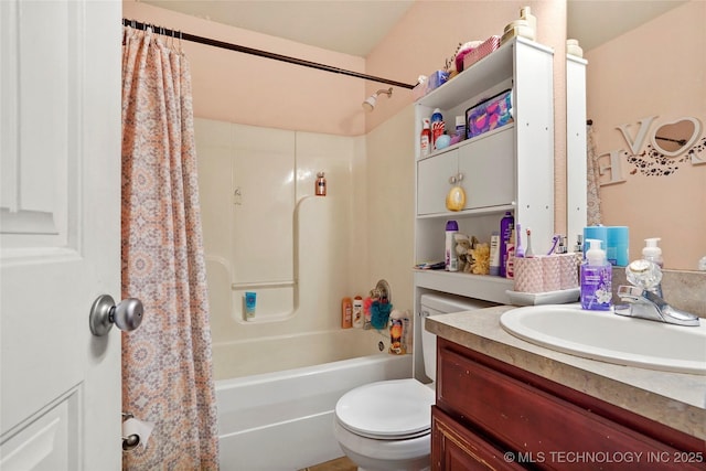 full bathroom with shower / bath combination with curtain, vanity, and toilet