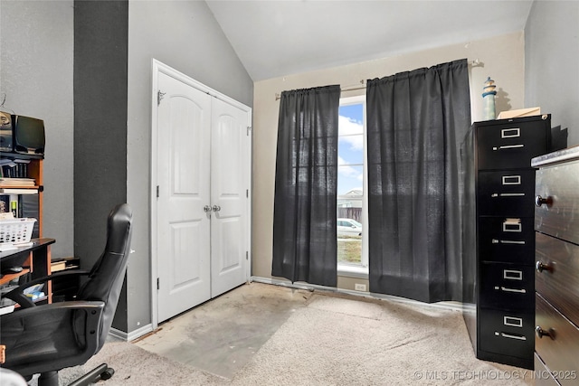 office space with vaulted ceiling