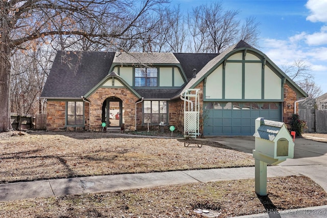 tudor-style house with a garage