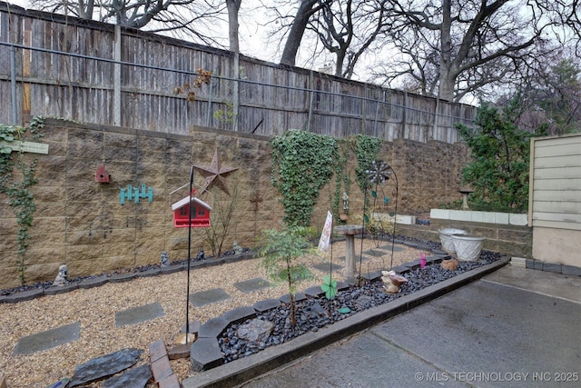 view of yard featuring fence