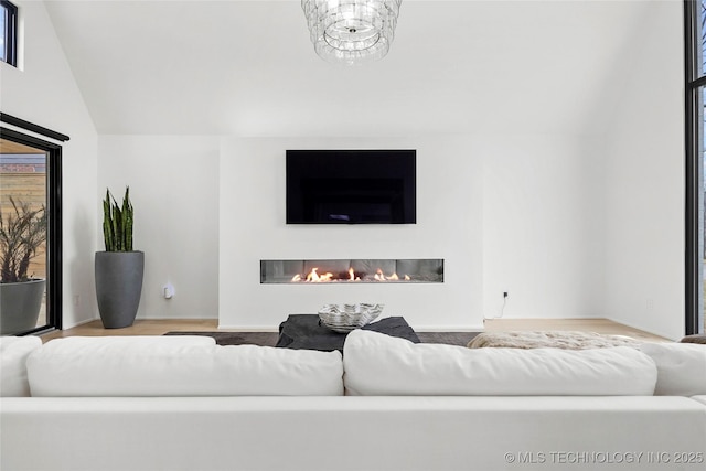 living room with lofted ceiling