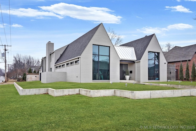 view of home's exterior featuring a lawn