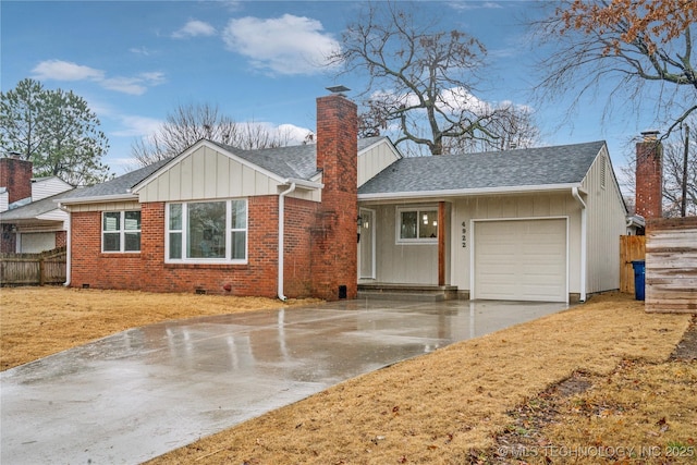 ranch-style house featuring a garage