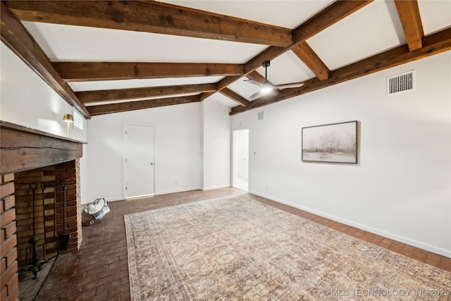 unfurnished living room with lofted ceiling with beams and a fireplace