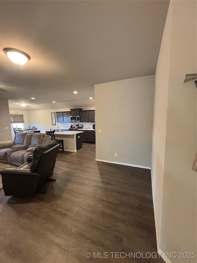 living room featuring dark hardwood / wood-style flooring