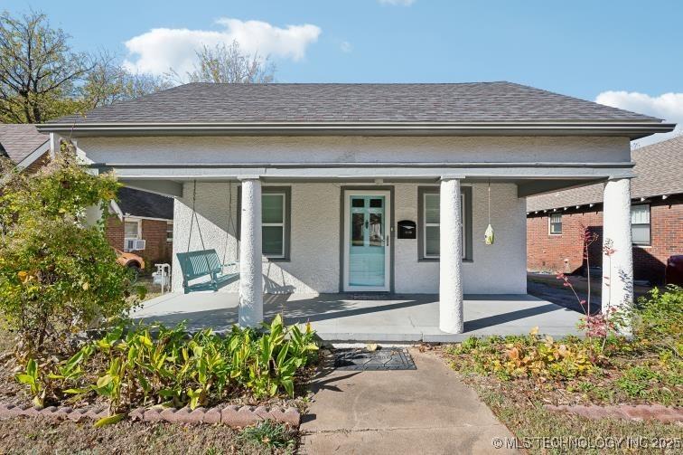 view of front of property with a porch