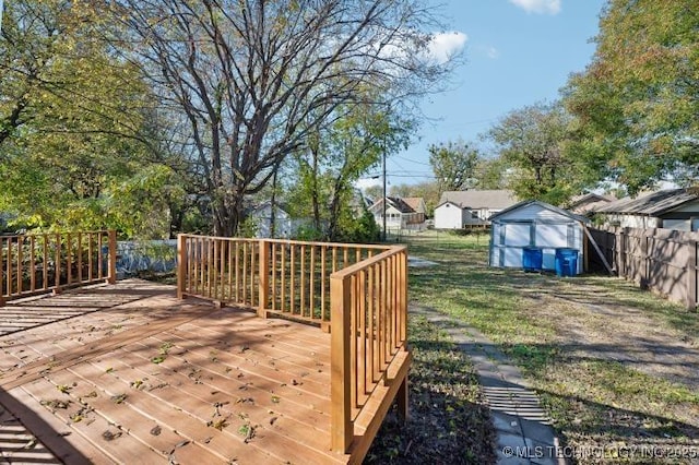 wooden deck featuring a shed