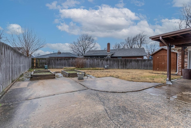 view of patio / terrace featuring a shed