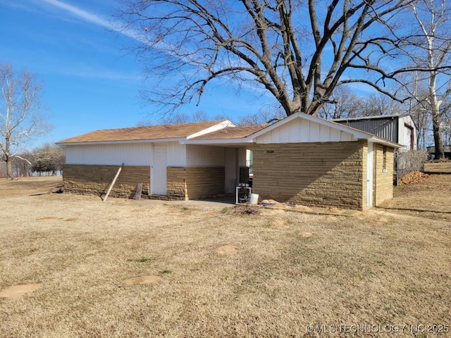 exterior space with a front lawn