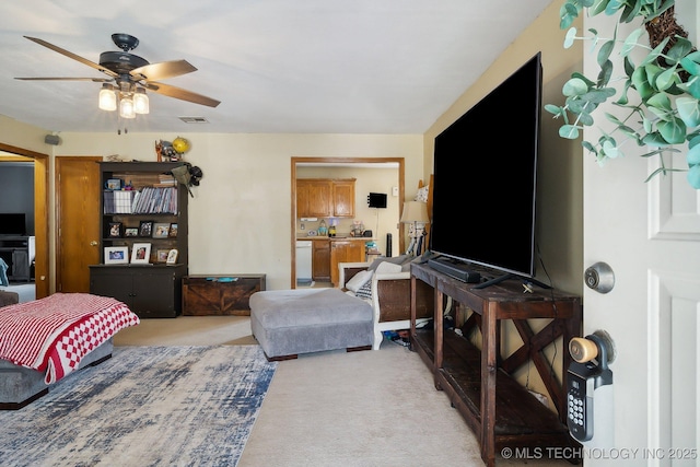 living room with ceiling fan and light carpet